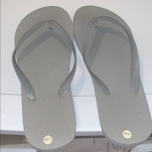 Gray flip flops